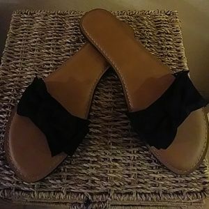 TIME and TRU sandals.